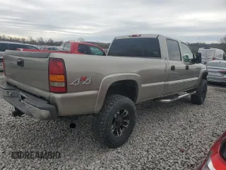 2003 GMC Sierra 2500HD SLT z VIN 1GTHK23183F142482, wystawiony jako Copart lot #51675765 z przebiegiem 198 316 mil mil oraz Szkoda całkowita • Salvage title. Historia ofert i sprzedaży dostępna na DreamBid. Obrazek 3.