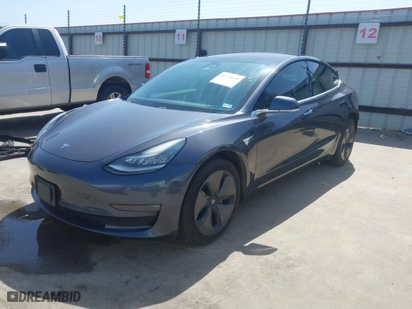 2018 Tesla Model 3 Long Range Battery with VIN 5YJ3E1EA4JF157782, listed as a IAAI auction lot 41774169 with 123,239 mi miles. Bid and sale history available at carsss.com. Image 23.