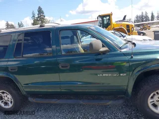 1999 Dodge Durango with VIN 1B4HS28Z3XF521133, listed as a IAAI auction lot 42068475 with 229,651 mi miles. Bid and sale history available at carsss.com. Image 13.