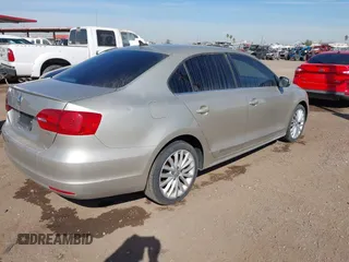2013 Volkswagen Jetta TDI w/Premium with VIN 3VWLL7AJ6DM234664, listed as a IAAI auction lot 41555219 with 131,692 mi miles and . Bid and sale history available at DreamBid. Image 4.