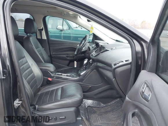 2015 Ford Escape Titanium with VIN 1FMCU9J96FUA27221, listed as a IAAI auction lot 41925276 with 180,758 mi miles and . Bid and sale history available at carsss.com. Image 5.