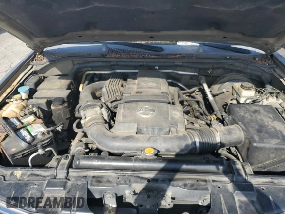 2006 Nissan Pathfinder SE z VIN 5N1AR18WX6C605168, wystawiony jako Copart lot #51843215 z przebiegiem 225 334 mil mil oraz Czysty tytuł • Clean title. Historia ofert i sprzedaży dostępna na DreamBid. Obrazek 11.