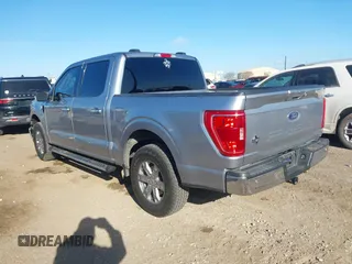 2021 Ford F-150 XL with VIN 1FTEW1CP3MFC30671, listed as a IAAI auction lot 41670207 with 56,540 mi miles. Bid and sale history available at carsss.com. Image 3.