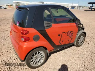 2008 Smart fortwo Pure z VIN WMEEJ31X78K123537, wystawiony jako Copart lot #48391295 z przebiegiem 94 051 mil mil oraz Szkody całkowita. Historia ofert i sprzedaży dostępna na DreamBid. Obrazek 3.