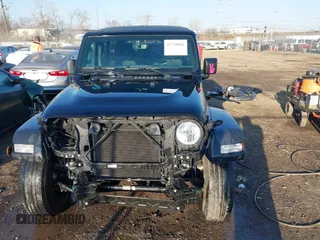2022 Jeep Wrangler Unlimited Sport S with VIN 1C4HJXDG5NW135060, listed as a IAAI auction lot 41738841 with 33,322 mi miles. Bid and sale history available at carsss.com. Image 13.
