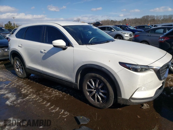 2017 Mazda CX-9 Sport with VIN JM3TCBBY1H0138961, listed as a Copart auction lot 44017305 with 81,546 mi miles and Salvage Title. Bid and sale history available at carsss.com. Image 4.