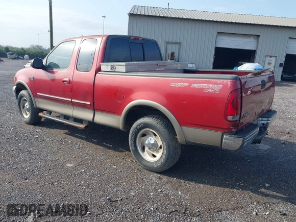 2001 Ford F-150 XL with VIN 1FTRX18L41KF38469, listed as a IAAI auction lot 41954075 with 219,967 mi miles. Bid and sale history available at carsss.com. Image 3.