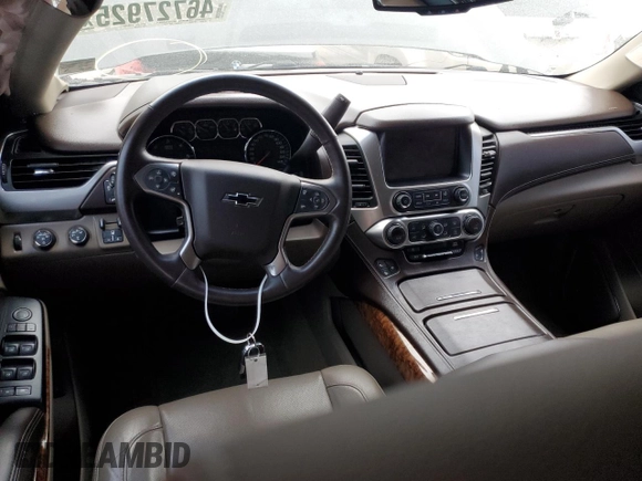 2015 Chevrolet Tahoe LTZ z VIN 1GNSKCKC9FR729198, wystawiony jako Copart lot #46727925 z przebiegiem 113 819 mil mil oraz Szkoda całkowita • Salvage title. Historia ofert i sprzedaży dostępna na DreamBid. Obrazek 8.