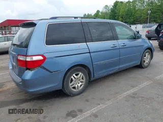 2007 Honda Odyssey EX with VIN 5FNRL38437B126937, listed as a IAAI auction lot 42098793 with 212,343 mi miles and . Bid and sale history available at DreamBid. Image 4.