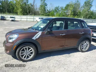 2016 MINI Countryman z VIN WMWZB3C55GWR48277, wystawiony jako Copart lot #64416355 z przebiegiem 99 251 mil mil oraz Czysty tytuł • Clean title. Historia ofert i sprzedaży dostępna na DreamBid. Obrazek 1.