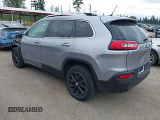 2014 Jeep Cherokee Latitude with VIN 1C4PJLCS1EW105984, listed as a IAAI auction lot 42242732 with 89,325 mi miles and . Bid and sale history available at DreamBid. Image 3.