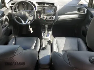 2015 Honda Fit EX-L with VIN 3HGGK5H86FM704890, listed as a Copart auction lot 52186675 with 114,098 mi miles and Salvage Title. Bid and sale history available at DreamBid. Image 8.