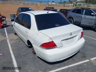2006 Mitsubishi Lancer ES with VIN JA3AJ26E56U012676, listed as a IAAI auction lot 41857476 with 1 mi miles. Bid and sale history available at carsss.com. Image 3.