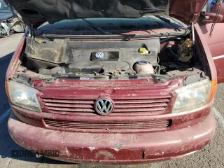 2003 Volkswagen EuroVan MV с VIN WV2NB47013H001081, выставлен на аукционе Copart как лот 82126354 с пробегом 158 433 миль миль и Чистый • Clean title. История ставок и продаж доступна на DreamBid. Изображение 12.