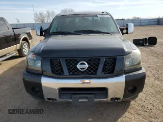 2015 Nissan Titan Pro-4X with VIN 1N6BA0EC9FN507495, listed as a Copart auction lot 49336715 with 95,749 mi miles and Clean title. Bid and sale history available at DreamBid. Image 5.