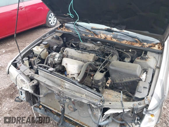 1998 Toyota Camry LE z VIN 4T1BG22KXWU202064, wystawiony jako IAAI lot #42294073 z przebiegiem 245 032 mil mil oraz . Historia ofert i sprzedaży dostępna na DreamBid. Obrazek 10.