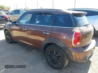 2013 MINI Countryman S ALL4 with VIN WMWZC5C58DWP30998, listed as a IAAI auction lot 42594984 with 153,792 mi miles and . Bid and sale history available at DreamBid. Image 3.