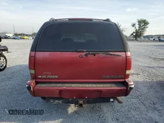 1996 Chevrolet Blazer z VIN 1GNCS13W7T2150216, wystawiony jako Copart lot #54006685 z przebiegiem 1 518 487 mil mil oraz Szkoda całkowita • Salvage title. Historia ofert i sprzedaży dostępna na DreamBid. Obrazek 6.