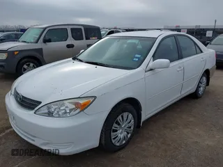 2004 Toyota Camry LE with VIN 4T1BF32K14U067269, listed as a IAAI auction lot 41528507 with 208,346 mi miles. Bid and sale history available at carsss.com. Image 6.