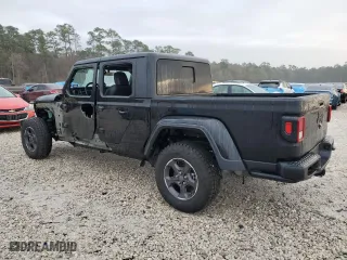 2021 Jeep Gladiator Sport S with VIN 1C6JJTAG7ML590031, listed as a Copart auction lot 43600245 with 56,955 mi miles and Salvage Title. Bid and sale history available at carsss.com. Image 2.