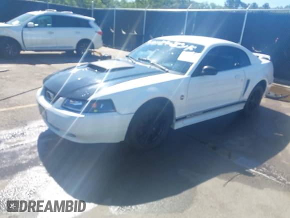 2004 Ford Mustang Standard z VIN 1FAFP40654F229283, wystawiony jako IAAI lot #42309648 z przebiegiem 164 610 mil mil oraz . Historia ofert i sprzedaży dostępna na DreamBid. Obrazek 18.