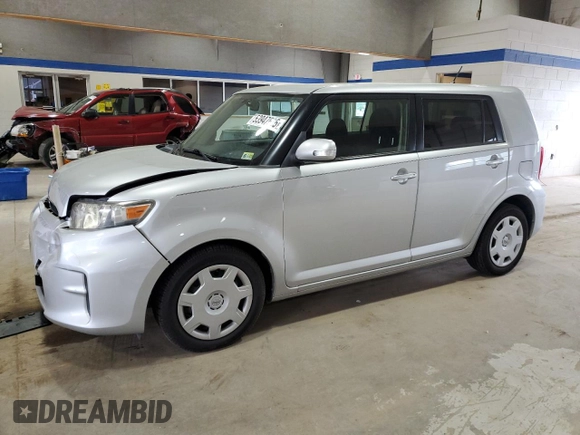 2012 Scion xB with VIN JTLZE4FE4CJ017485, listed as a Copart auction lot 53947535 with 113,979 mi miles and Salvage Title. Bid and sale history available at DreamBid. Image 1.