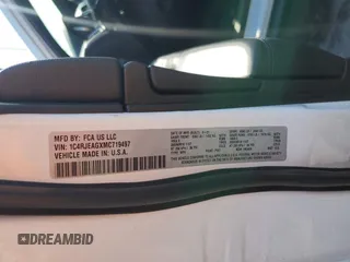 2021 Jeep Grand Cherokee Laredo E with VIN 1C4RJEAGXMC719497, listed as a Copart auction lot 60830315 with 3,873 mi miles and Salvage title. Bid and sale history available at DreamBid. Image 13.