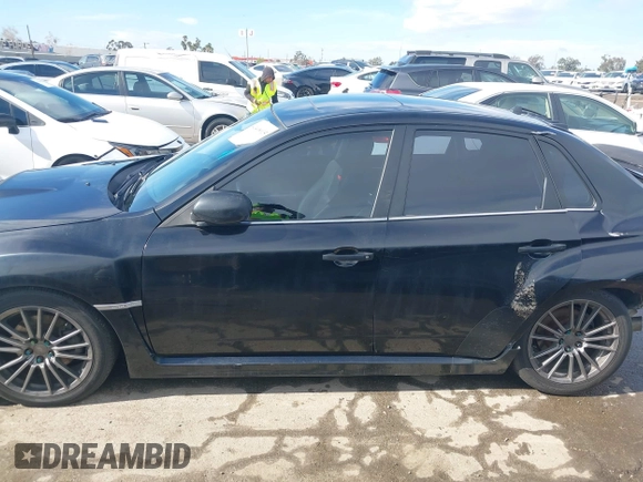 2014 Subaru Impreza Sedan WRX WRX Premium with VIN JF1GV7F6XEG011659, listed as a IAAI auction lot 41408915 with 133,836 mi miles. Bid and sale history available at carsss.com. Image 14.