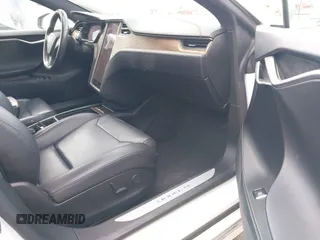 2018 Tesla Model S 75D with VIN 5YJSA1E23JF271465, listed as a IAAI auction lot 41911356 with 50,483 mi miles and . Bid and sale history available at DreamBid. Image 5.