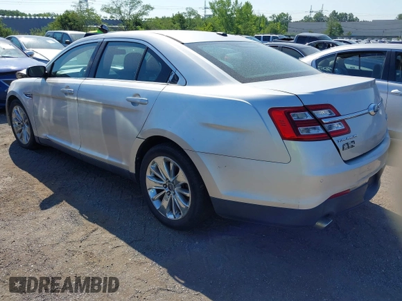 2013 Ford Taurus Limited with VIN 1FAHP2F83DG231176, listed as a IAAI auction lot 42776538 with 220,580 mi miles and . Bid and sale history available at DreamBid. Image 3.