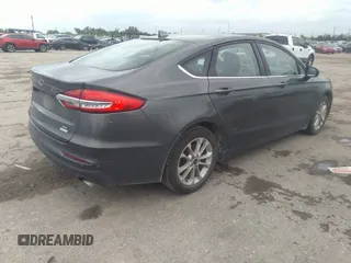 2020 Ford Fusion SE with VIN 3FA6P0HD8LR230263, listed as a IAAI auction lot 42069350 with 76,936 mi miles and . Bid and sale history available at DreamBid. Image 4.