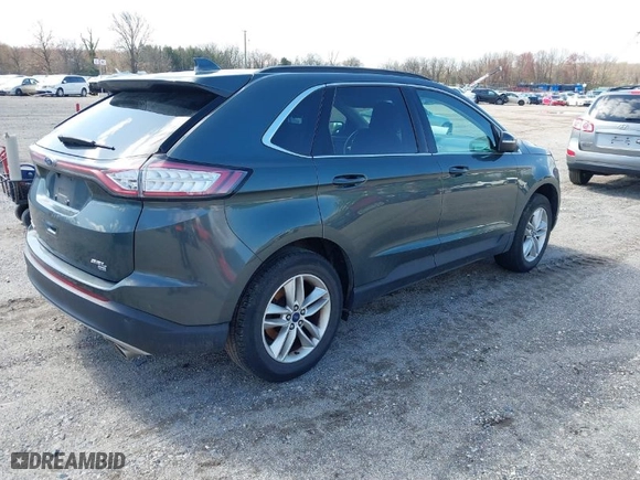 2015 Ford Edge SEL with VIN 2FMTK4J8XFBC18727, listed as a IAAI auction lot 41939117 with 116,736 mi miles. Bid and sale history available at carsss.com. Image 4.