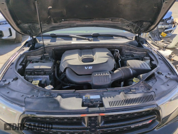 2015 Dodge Durango SXT with VIN 1C4RDHAG6FC850065, listed as a Copart auction lot 57144295 with 243,646 mi miles and Salvage title. Bid and sale history available at DreamBid. Image 12.
