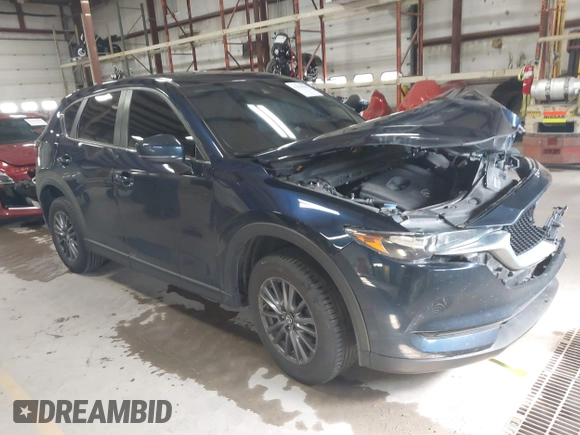 2020 Mazda CX-5 Touring with VIN JM3KFBCM6L0739077, listed as a IAAI auction lot 41810946 with 82,911 mi miles and . Bid and sale history available at carsss.com. Image 1.