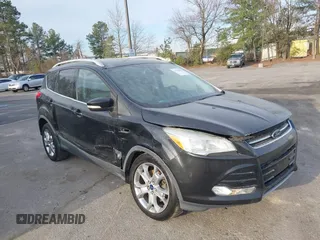 2015 Ford Escape Titanium with VIN 1FMCU0J98FUA19911, listed as a IAAI auction lot 41750596 with 106,706 mi miles. Bid and sale history available at carsss.com. Image 6.