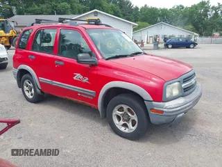2001 Chevrolet Tracker ZR2 with VIN 2CNBJ734816935817, listed as a IAAI auction lot 42552311 with 216,128 mi miles and . Bid and sale history available at DreamBid. Image 1.