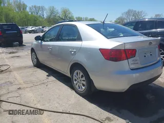 2010 Kia Forte LX with VIN KNAFT4A29A5061695, listed as a IAAI auction lot 42034559 with 114,470 mi miles. Bid and sale history available at carsss.com. Image 3.