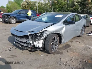 2024 Toyota Prius LE with VIN JTDACAAU2R3020491, listed as a IAAI auction lot 42004580 with 22,812 mi miles and . Bid and sale history available at DreamBid. Image 17.