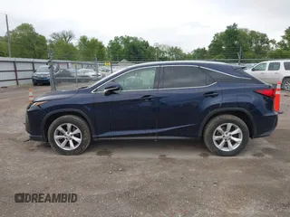 2016 Lexus RX 350 with VIN 2T2BZMCA1GC012079, listed as a IAAI auction lot 42265304 with 124,861 mi miles and . Bid and sale history available at DreamBid. Image 14.