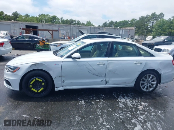 2014 Audi A6 Prestige with VIN WAUHGAFCXEN091050, listed as a IAAI auction lot 42524560 with 169,575 mi miles and . Bid and sale history available at DreamBid. Image 6.
