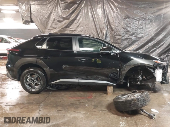 2024 Toyota bZ4X XLE z VIN JTMAAAAA3RA043494, wystawiony jako IAAI lot #41509723 z przebiegiem 5 279 mil mil oraz . Historia ofert i sprzedaży dostępna na DreamBid. Obrazek 14.