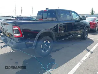 2019 Ram 1500 Rebel with VIN 1C6SRFLT2KN592652, listed as a IAAI auction lot 41989054 with 71,630 mi miles and . Bid and sale history available at DreamBid. Image 4.