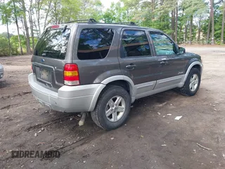 2005 Ford Escape Hybrid with VIN 1FMCU95H45KD91052, listed as a IAAI auction lot 42200393 with 304,817 mi miles and . Bid and sale history available at DreamBid. Image 4.