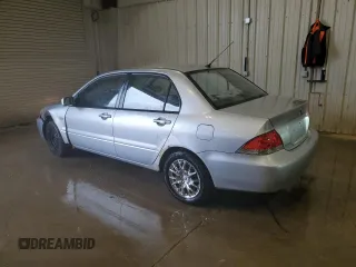 2006 Mitsubishi Lancer ES z VIN JA3AJ26E36U014104, wystawiony jako Copart lot #59814245 z przebiegiem 144 780 mil mil oraz Nie do naprawy • Non repairable. Historia ofert i sprzedaży dostępna na DreamBid. Obrazek 2.