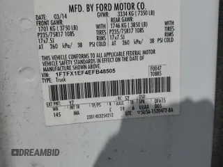 2014 Ford F-150 XL with VIN 1FTFX1EF4EFB48505, listed as a Copart auction lot 58985655 with 195,068 mi miles and Salvage title. Bid and sale history available at DreamBid. Image 12.