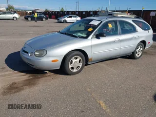 1996 Ford Taurus GL z VIN 1FALP57U9TG184497, wystawiony jako IAAI lot #42290105 z przebiegiem 149 155 mil mil oraz . Historia ofert i sprzedaży dostępna na DreamBid. Obrazek 17.