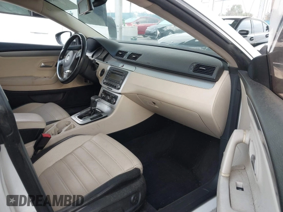 2009 Volkswagen CC Sport with VIN WVWML73C79E566020, listed as a IAAI auction lot 42140306 with 133,411 mi miles. Bid and sale history available at carsss.com. Image 5.