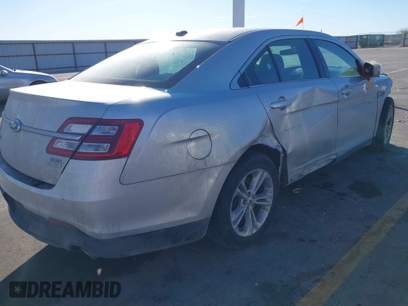 2013 Ford Taurus SEL with VIN 1FAHP2E83DG224780, listed as a IAAI auction lot 41675601 with 166,977 mi miles. Bid and sale history available at carsss.com. Image 4.