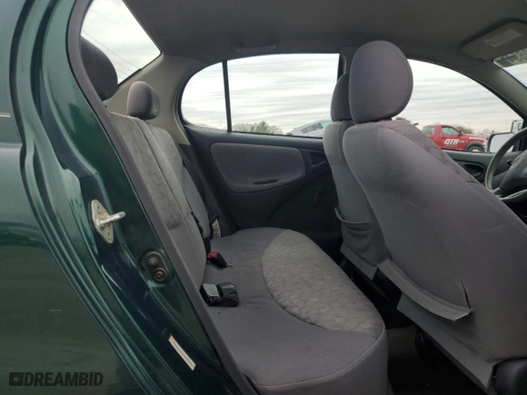 2002 Toyota ECHO with VIN JTDBT123X25027211, listed as a Copart auction lot 51798545 with 223301 miles and Clean Title. Bid and sale history available at carsss.com. Image 10.