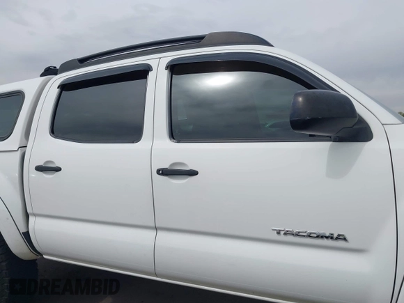 2009 Toyota Tacoma PreRunner with VIN 3TMJU62N49M076433, listed as a IAAI auction lot 41902369 with 164,827 mi miles. Bid and sale history available at carsss.com. Image 13.